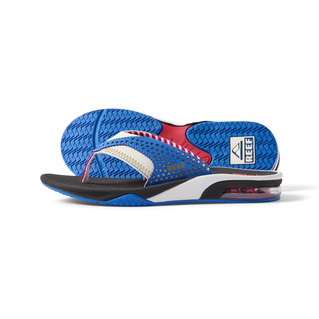 Kids Fanning boys’ right-facing sandal with blue and red accents, showing sole and side profile, cushioned and arch supported