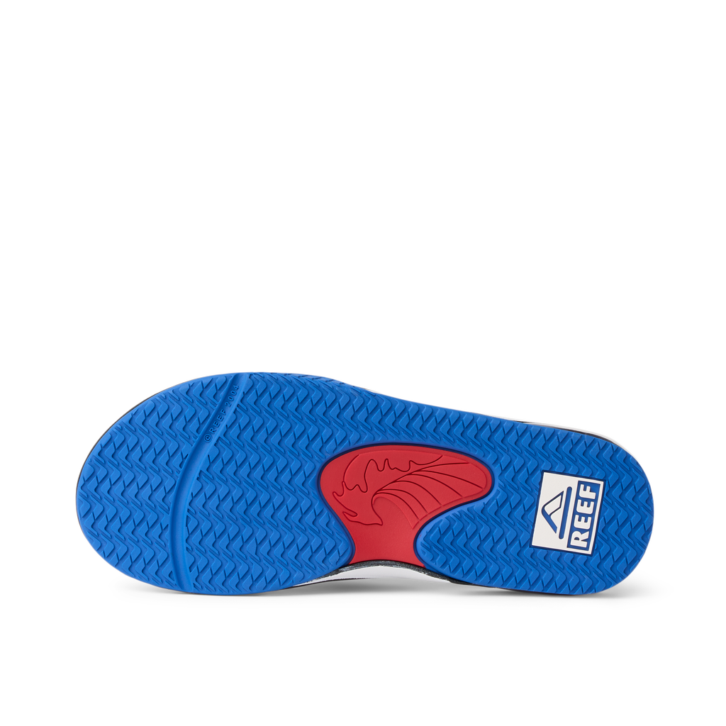 Kids Fanning outsole facing up showing traction pattern and arch support, beach-inspired comfort for boys ages 5-10.